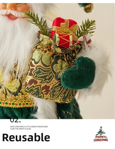 Close-up of Santa doll with green gold embroidery and red gift bag holding presents