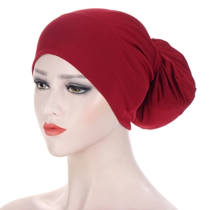 Elastic burgundy chemo headwear for women featuring a minimalist turban wrap design