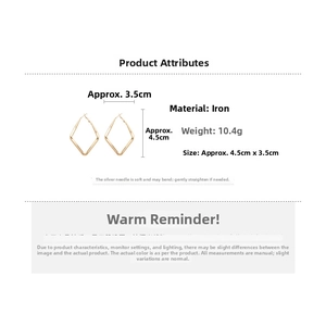 Detailed view of gold geometric diamond drop earrings with precise dimensions and weight