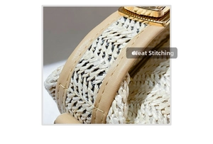 Detailed close-up of neat stitching on light brown leather edge of woven straw bag