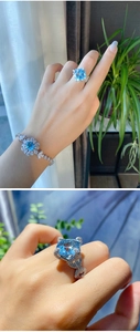Macro detail of aquamarine-style square ring with pave-set diamond twisted band design