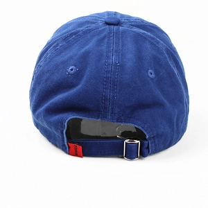 Navy blue cotton baseball cap rear view with adjustable metal buckle and red tab