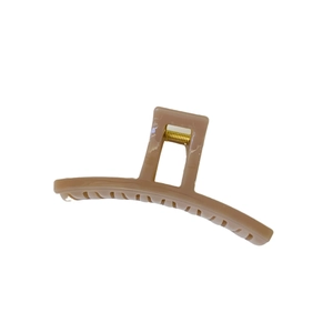 Minimalist beige matte shark hair claw clip for thick hair shown on a white background