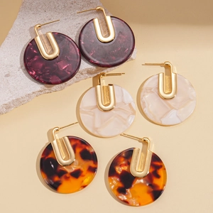 Elegant 18K gold-plated acetate round earrings in marble, cream, and tortoiseshell colors