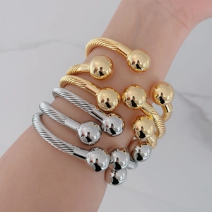 French vintage twisted cable cuff bracelet with polished gold and silver ball ends