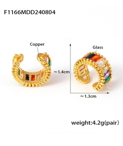 Detail view of colorful glass stone ear cuffs in copper with exact size measurements