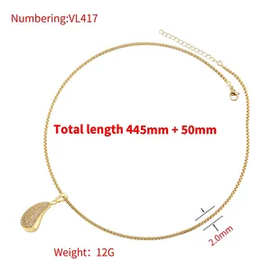 Collier doré avec pendentif goutte d'eau serti de zircons et chaîne ajustable de luxe