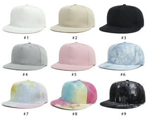 Collage of kids flat brim hip-hop hats in solid colors and tie-dye patterns numbered 1 to 9