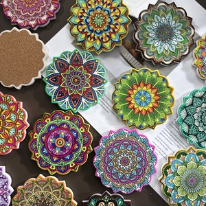 Octagonal mandala ceramic coasters with golden vintage patterns and non-slip cork base