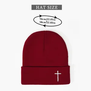 Size chart for embroidered cross knit beanie showing 56-58cm head circumference measurement