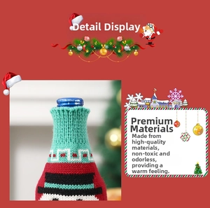 Close-up of festive acrylic knit wine bottle cover with snowman and Santa patterns