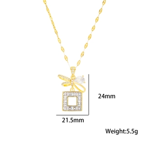Elegant gold bow necklace with square clear gemstone pendant and dimension details