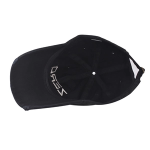 Detail view of cotton baseball cap showing internal wash label and ZERO embroidery
