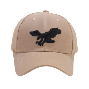 Khaki baseball cap with detailed black eagle embroidery and classic six-panel design