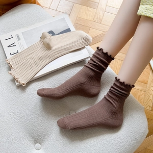 Japanese style frilly cotton crew socks with vertical stripes and lettuce trim design