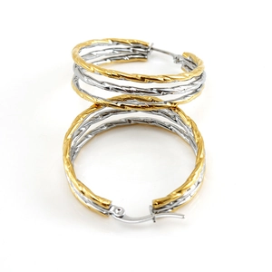 Two-tone gold and silver stainless steel hoop earrings with elegant twisted texture