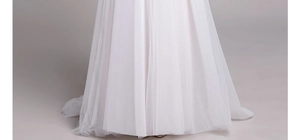 Détail de la jupe de robe mariée multicouche en tulle blanc ivoire jusqu'au sol