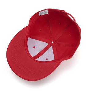 Internal view of red flat brim hip hop cap showing 6-panel structure and cotton-poly lining