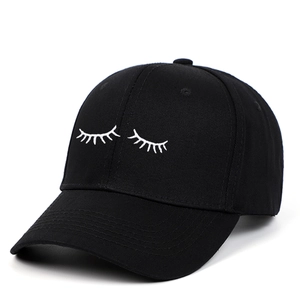 Classic black cotton baseball cap with white eyelash embroidery and curved brim