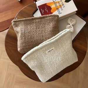 Minimalist wool tweed cosmetic bag in beige and coffee brown with simple wish label