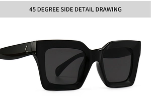 Detail view of square black sunglasses with thick frame and silver triple rivet accents