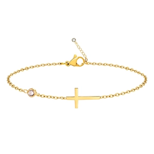 Elegant gold cross bracelet with pink zircon stone on a minimalist white background