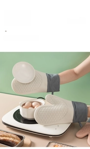 Kitchen silicone heat-resistant glove with anti-slip texture and grey fabric cuff hook