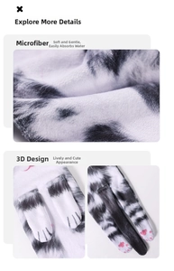 Detail of microfiber cat hand towel with 3D paw design and absorbent fabric texture