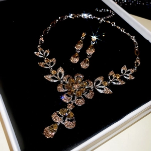 Detail of luxury flower jewelry set with sparkling rhinestones in a gift box
