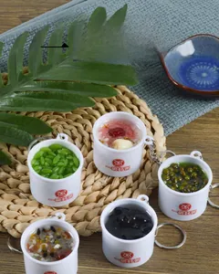 Detailed top view of realistic miniature eight-treasure porridge food model keychains