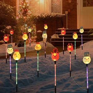 Outdoor LED Christmas garden stake lights featuring Santa, snowman and reindeer designs