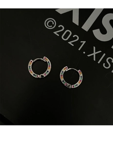 Close-up of rainbow hoop earrings with colorful cubic zirconia in silver finish