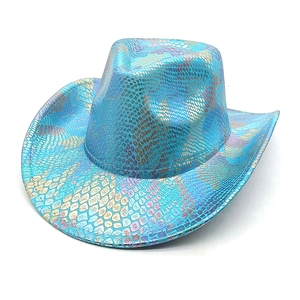 Macro detail of vibrant blue laser cowgirl hat with shiny snake scale texture and large brim