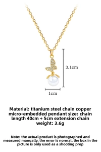 Detail of gold butterfly pearl necklace showing pendant size 3.1x1cm and 45cm chain length