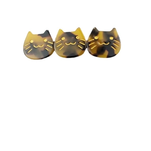 Three tortoiseshell cat acetate hair clips for women with elegant golden facial details