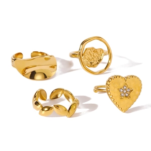 Set of four 18K gold plated stainless steel rings with irregular and heart shapes