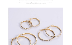 Three sizes of 18K gold plated wavy hoop earrings with micro-set shimmering crystals