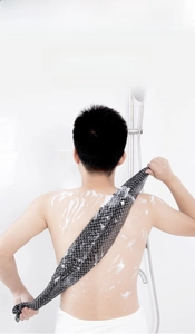 Macro texture of double-sided exfoliating back scrubber with quick-dry nylon mesh