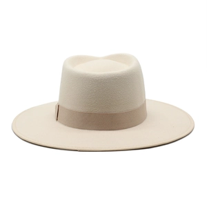 Close-up of beige wool felt fedora showing texture, wide brim and matching ribbon
