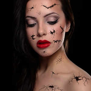 Halloween cracked face tattoo stickers in black horror makeup style for party costumes