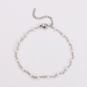 Detail of baroque pearl bracelet with silver chain, lobster clasp, and extender