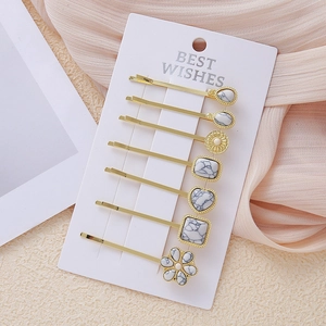 Elegantes 7-teiliges goldenes Haarklammer-Set mit weißem Marmormuster in diversen Formen