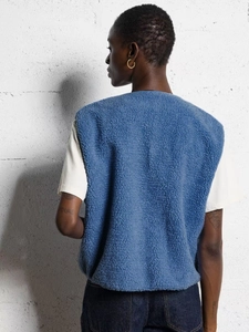 Blue sherpa fleece sleeveless vest for women showing back view with high texture detail