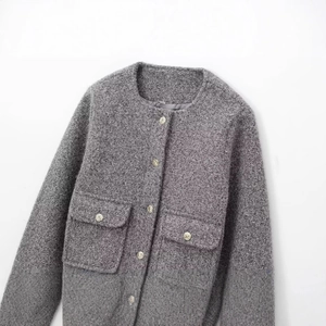 Grey tweed jacket with metallic gold buttons, round neck design and decorative flap pockets