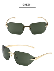 Detail of rimless green lenses and gold metal temples on these stylish sunglasses
