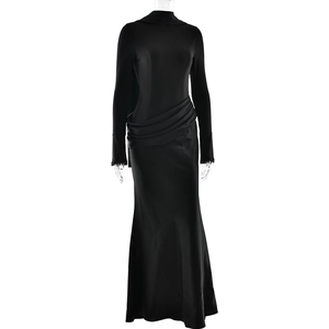 Detail view of elegant black long-sleeve maxi dress with waist pleats and cowl neck design
