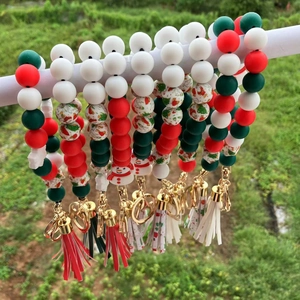 Christmas silicone bead keychain with snowman pattern and tassel pendant on white bar