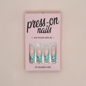Detail of 24-piece press-on nails featuring green and black abstract artistic wavy lines