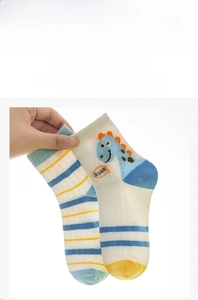 Detail of blue and yellow striped cotton kids socks with cute dinosaur and ROAR embroidery