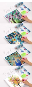 DIY 5D diamond painting kit detail showing colored resin rhinestones and sorting tools
